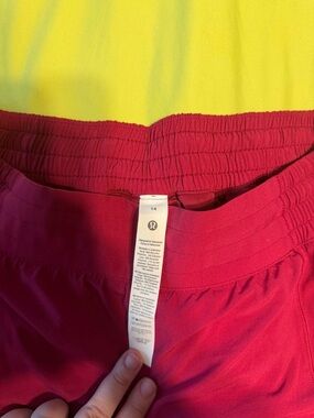 lululemon athletica Women's Athletic Shorts Raspberry colored.